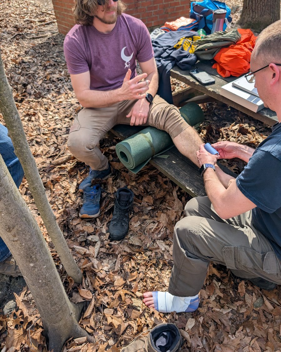 Reviewing gear in the field before a training exercise